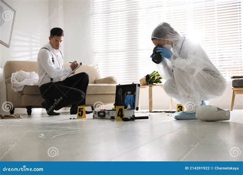 Investigators Working at Crime Scene in Living Room Stock Photo - Image of crime, floor: 214391922