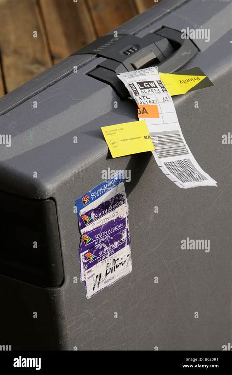 Airline luggage identification tag Stock Photo - Alamy