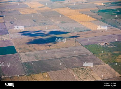 Aerial view of patchwork of farm fields along the Kansas, Colorado ...