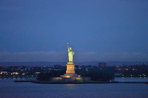 Royalty Free Statue Of Liberty At Night Pictures, Images and Stock Photos - iStock