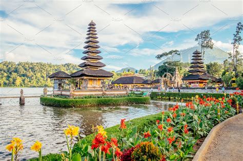 Pura Ulun Danu Bratan, Hindu temple surrounded by flowers on Bratan ...