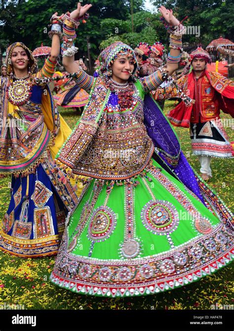 Girls in traditional attire, practice the Garba dance steps in preparation for the Navratri ...