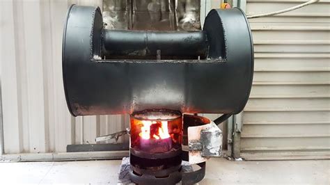 How to build a Dirt Cheap Waste oil Barrel Heater .Easy to make and also doubles as a cooker ...