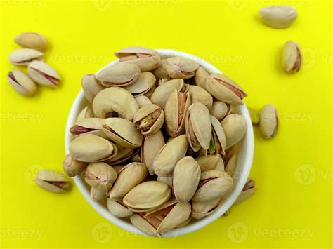 Roasted salted pistachio nuts in nutshell 23146999 Stock Photo at Vecteezy