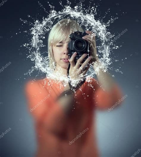 Girl photographing water splash — Stock Photo © papa42 #29741837