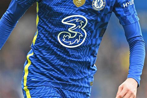 Chelsea have been urged to remove the logo of sponsor Three from their match-day shirts “as soon ...