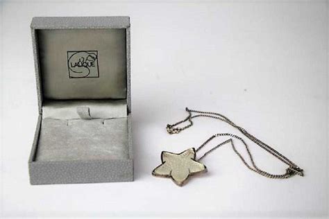 LALIQUE OCEANIA STAR FISH PENDANT