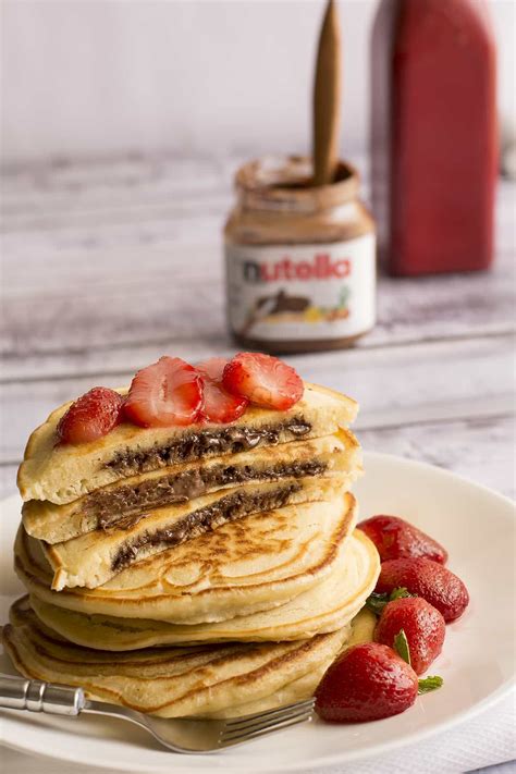 These Nutella Pancakes are stuffed with warm & oozy Nutella and topped ...