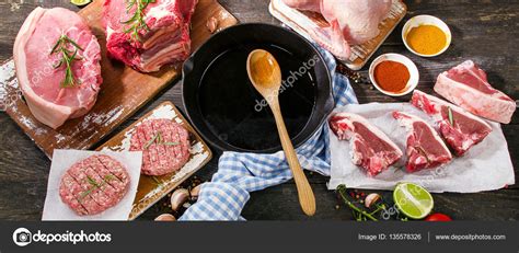 Different types of raw meat with fresh vegetables and herbs Stock Photo by ©bit245 135578326