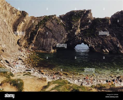 Lulworth cove beach Stock Photo - Alamy