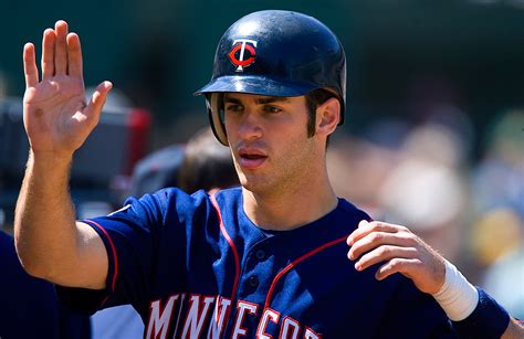 Joe Mauer wins AL Most Valuable Player Award - Mangin Photography Archive