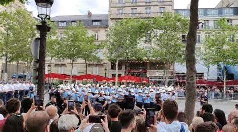 Bastille Day parade 2023: Firemen form a circle. 14 july 2023. Champs ...