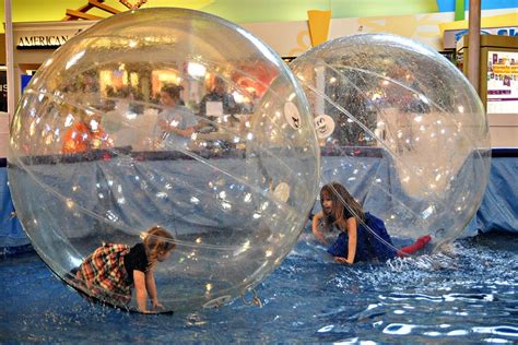 human hamster ball + water. YES | Eid al fitr, Christmas bulbs, Fun