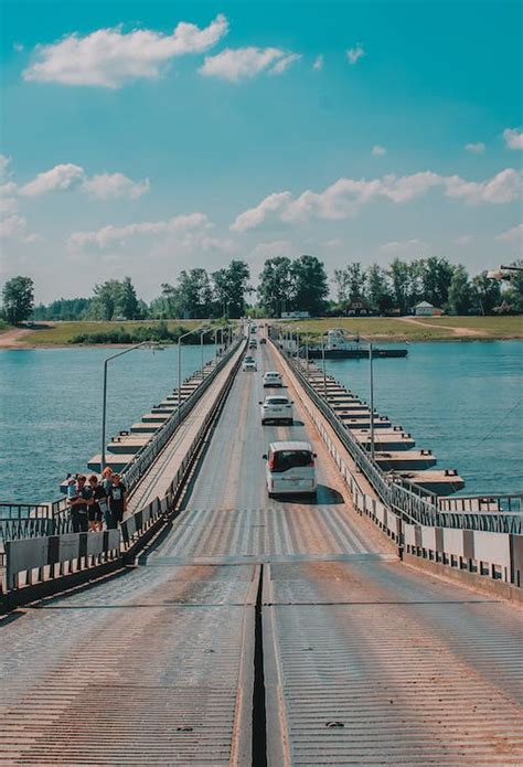 Cars Running on Pontoon Bridge · Free Stock Photo