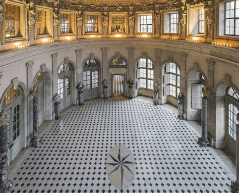 the inside of an ornate building with many windows