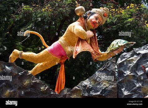 Lord Hanuman flying carrying mountain Pune Maharashtra India Asia Stock Photo - Alamy