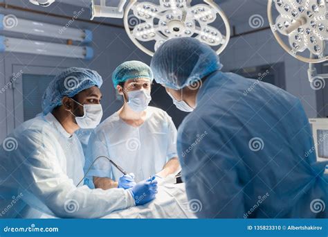 Team of Surgeons Operating in the Hospital Stock Photo - Image of caucasian, people: 135823310