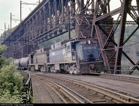 Conrail E33 electric locomotives #4608 and #4607 lead an eastbound manifest freight across the ...