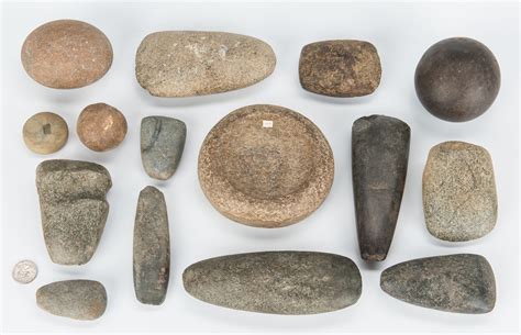 Lot 282: 15 Native American Stone Artifacts, incl. Discoidals | Case ...