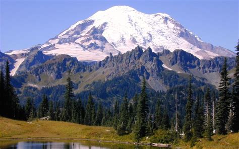 Mt. Rainier. Tallest volcano in the Cascade Range; elevation 4,392 meters (14,410ft). Photo by ...