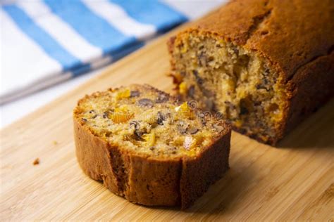 Spongecake with Orange and Candied Fruit. Stock Image - Image of nuts, brown: 268602829