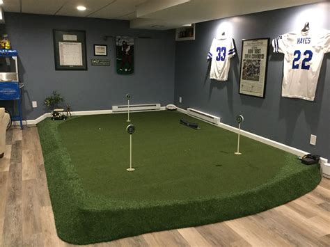 Our indoor putting green. Love it. | Golf room, Indoor putting green, Golf simulator room