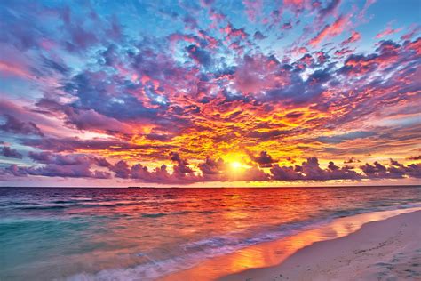 Colorful sunset over ocean in Maldives | Sunset painting, Pretty landscapes, Sunset wallpaper