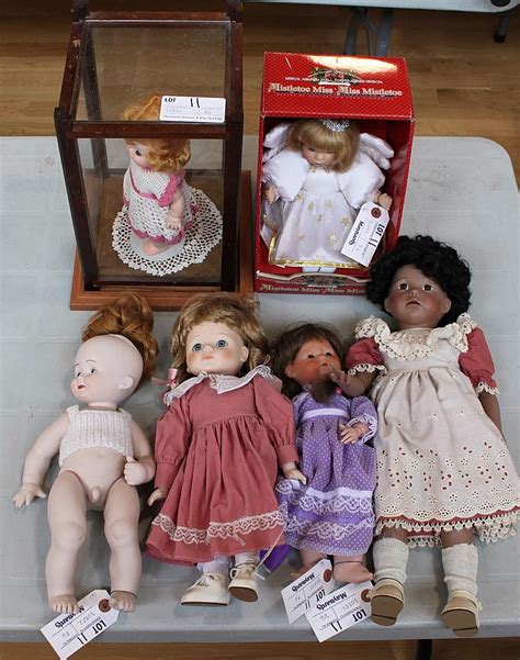 Lot - A collection of six porcelain dolls