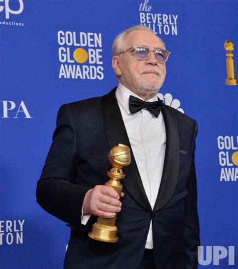 Photo: Brian Cox wins an award at the 77th Golden Globe Awards in ...