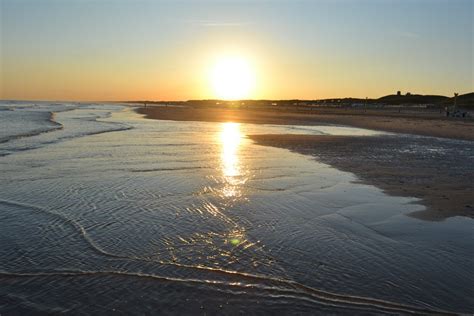 Free Images : scheveningen, zon, opkomst, body of water, sky, sea, horizon, water resources ...