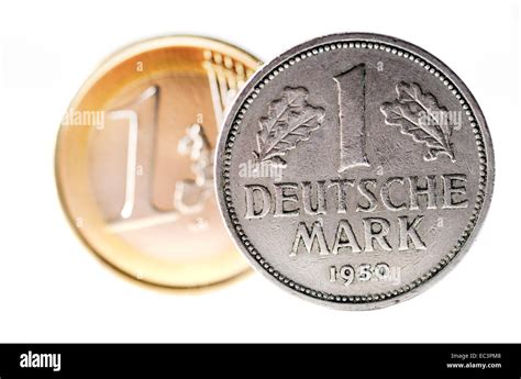 Deutsche Mark und 1 Euro Münze Stockfotografie - Alamy