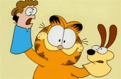 Playing Puppets Odie GIF - Playing Puppets Odie Jon Arbuckle - Discover & Share GIFs Funny ...