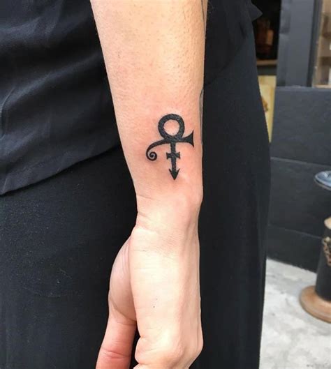 A symbol of this fan's love of Prince, Jes Melero got a simple but statement tribute tattoo ...