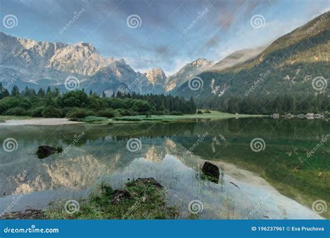 Lago Di Fusine E Monte Mangart With Row Boat Royalty-Free Stock Photo ...