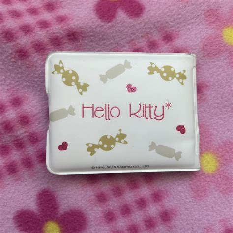 Hello kitty wallet with card holders and pocket... - Depop