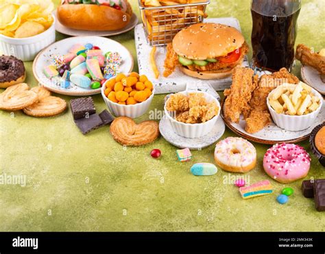 Assortment of various unhealthy junk food Stock Photo - Alamy