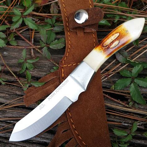 A skinning knife, a sheath, and laser engraving shipped for right at