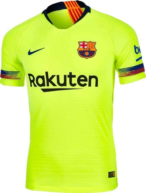 the nike barcelona away shirt is shown in yellow