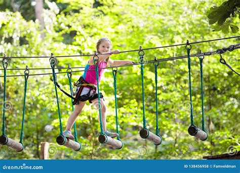 Child in Adventure Park. Kids Climbing Rope Trail Stock Photo - Image of adventure, park: 138456958