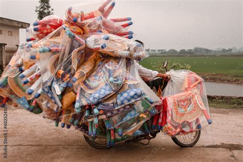 Vietnamese motorbike overloaded with cargo, shows the local culture and ...