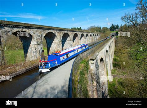 Narrow boats on Llangollen Canal crossing Chirk aqueduct, Wales, UK ...