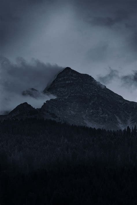 Download Captivating Dark Mountain Landscape Wallpaper | Wallpapers.com