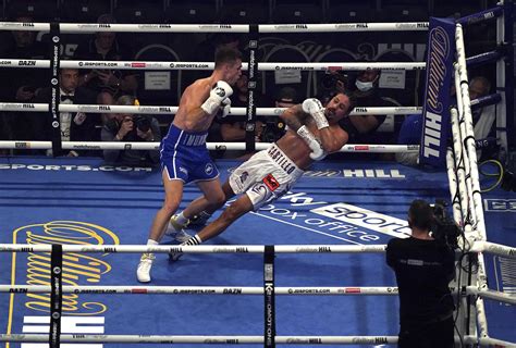 Dominican boxer hospitalized, 'responsive' after brutal KO | AP News