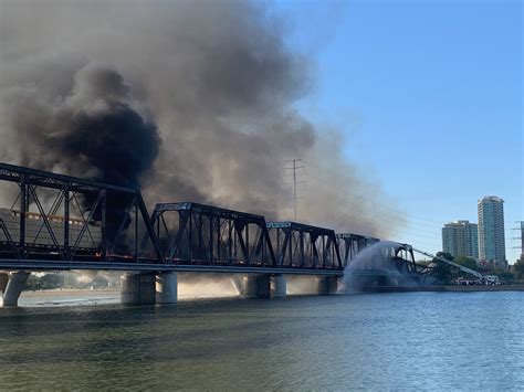 Train Derails Over Tempe Town Lake in Arizona, Causing Massive Fire ...