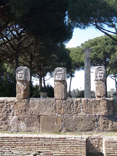 Masks in Ostia Antica's restored theatre. Photo by Roman Mysteries author Caroline Lawrence ...