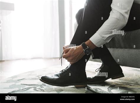 Suit shoes on bed hi-res stock photography and images - Alamy