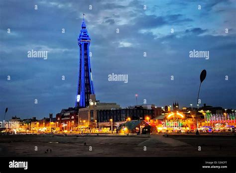 Blackpool promenade and Tower lit up at night Stock Photo - Alamy