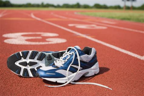 Running Shoes On Track I Stock Photo - Download Image Now - iStock