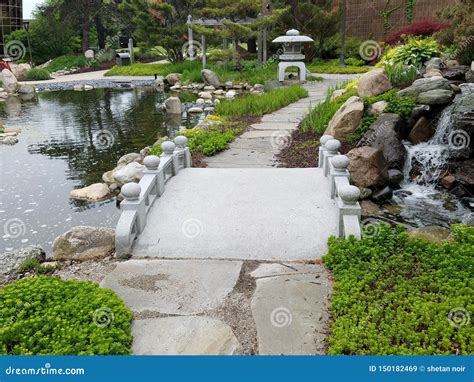 Stone Bridge in a Japanese Garden. Editorial Stock Image - Image of stone, bridge: 150182469