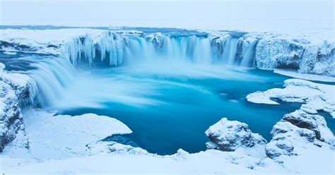 How to Explore the Frozen Waterfalls of Iceland